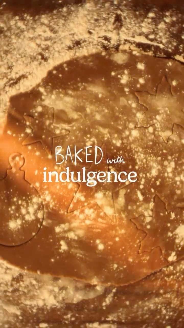 Baked With Indulgence written over a swirly brown liquid