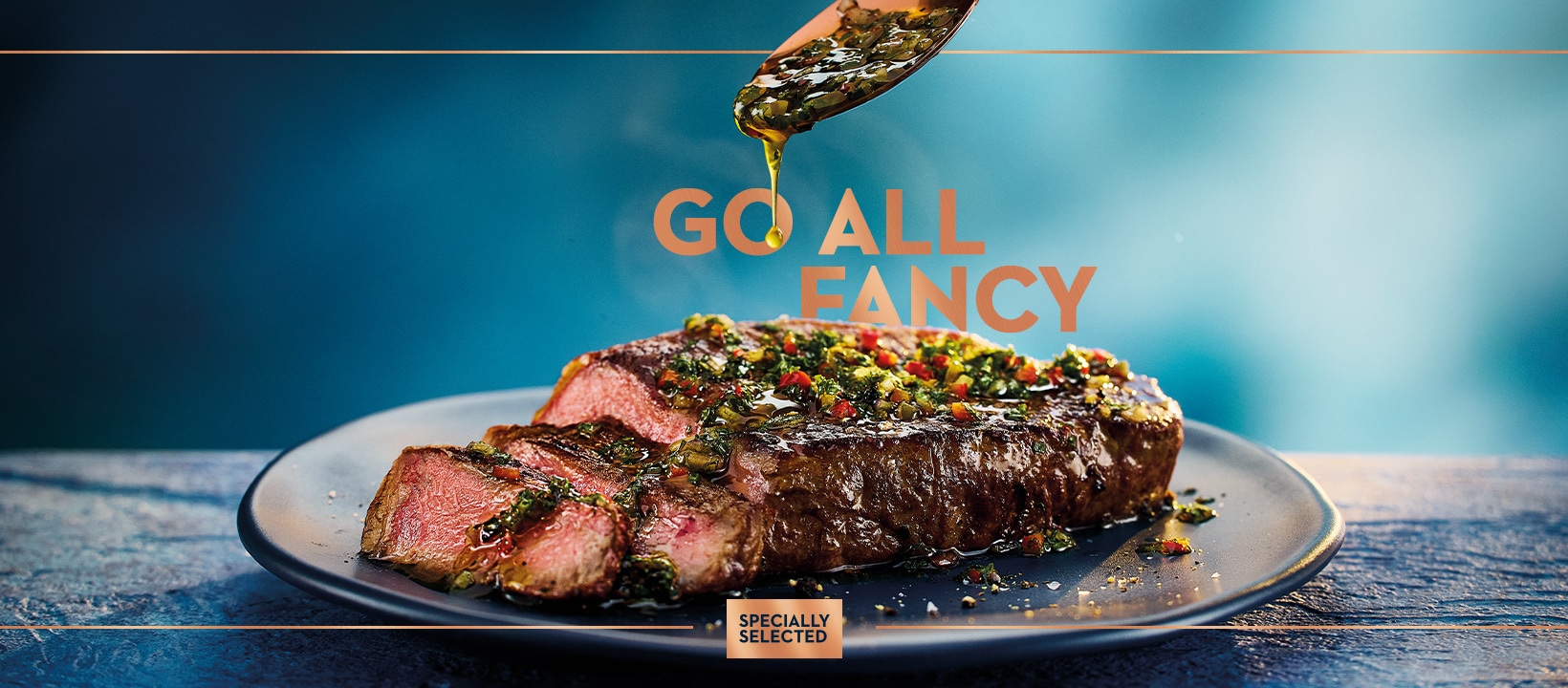 Steak with a sauce on it, with the text 'go all fancy'
